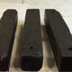 Some of the iron ballast bars that were shipped to the U.S. to be displayed at the Smithsonian Museum of African American History